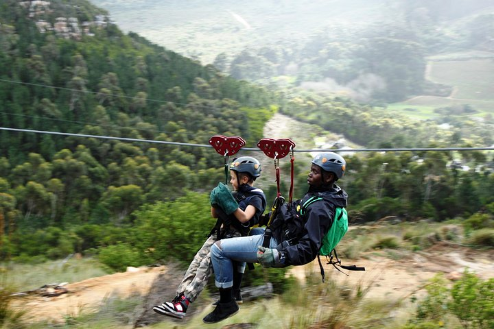 Soar above breathtaking landscapes and lush greenery while zip-lining at the foot of Table Mountain an unforgettable experience that showcases Cape Town’s natural beauty.